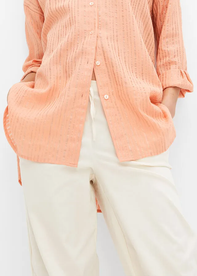BLUSA LARGA ALBARICOQUE PASTELORO