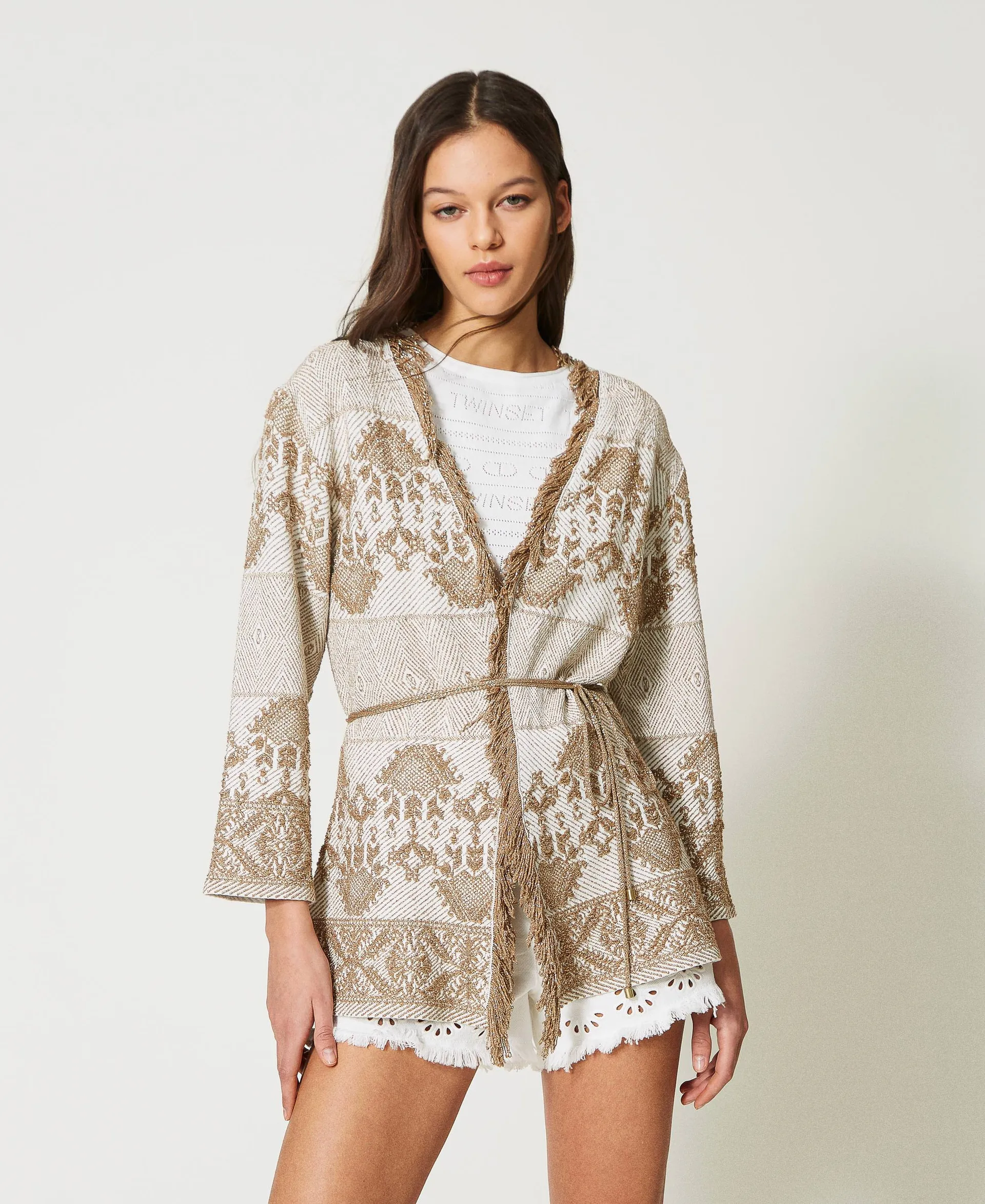 Chaqueta de punto jacquard con flecos