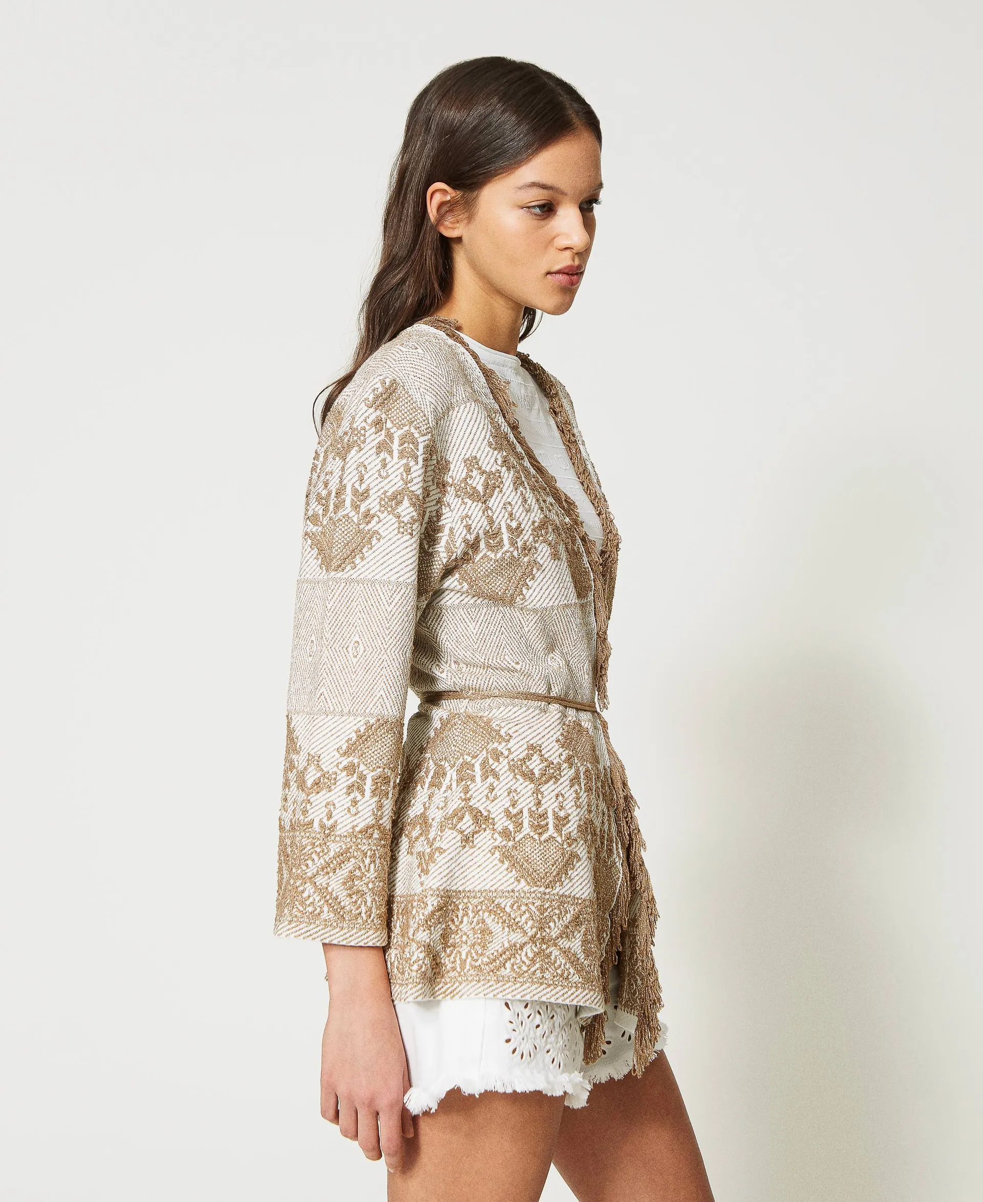 Chaqueta de punto jacquard con flecos