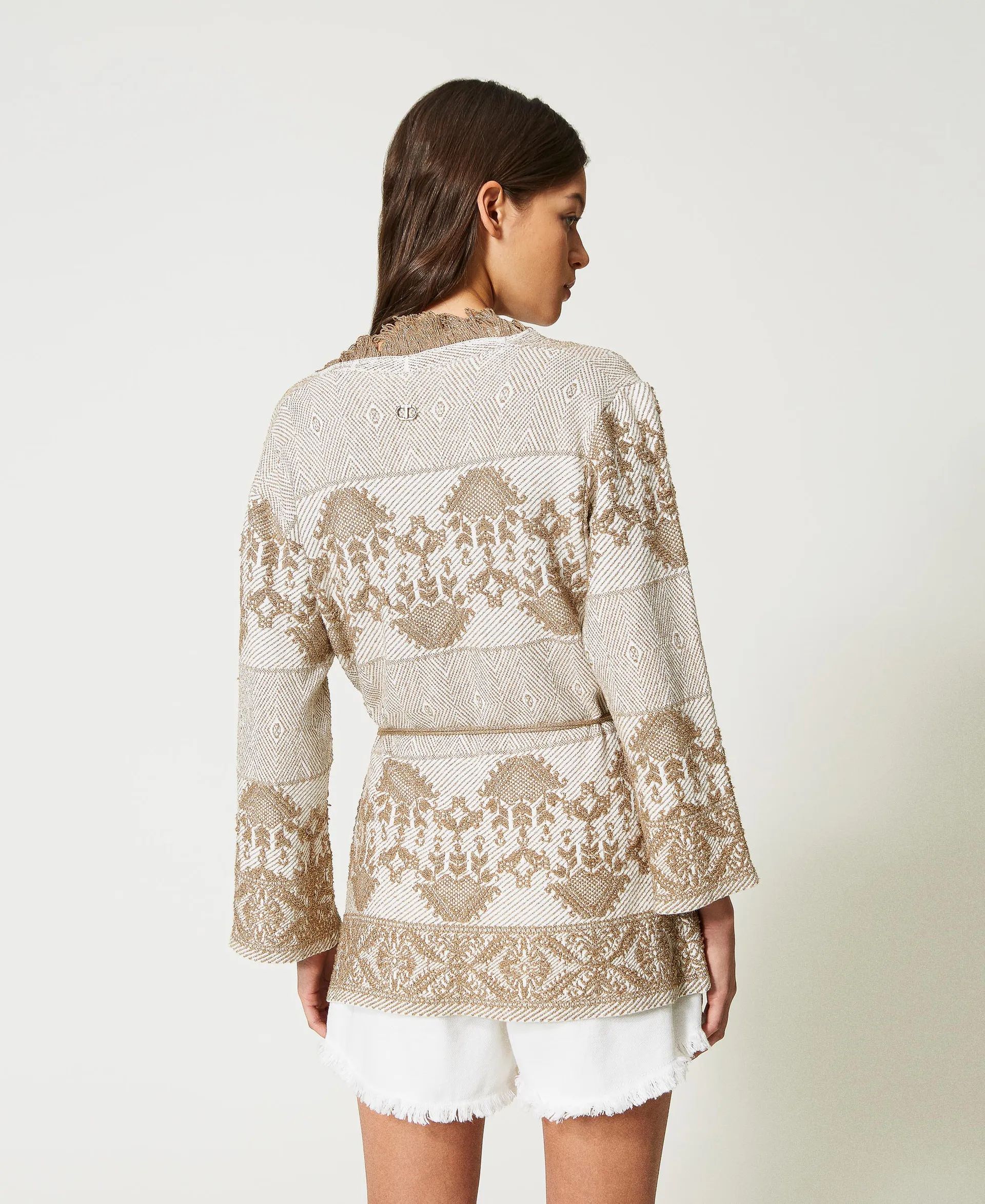 Chaqueta de punto jacquard con flecos