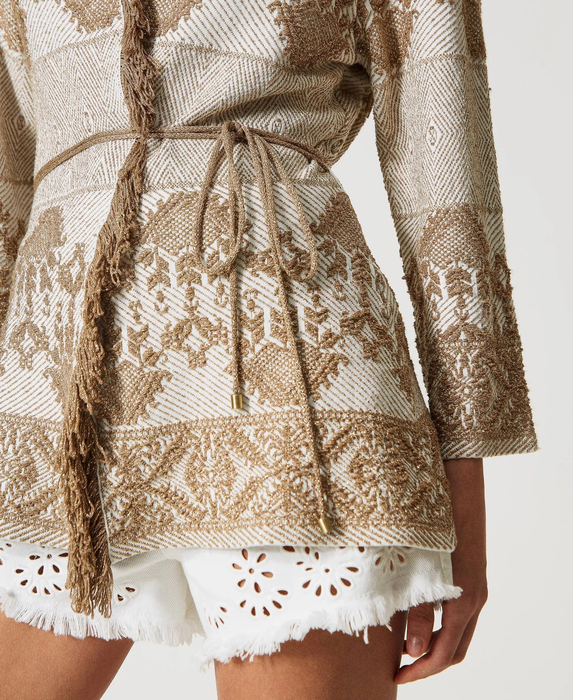 Chaqueta de punto jacquard con flecos