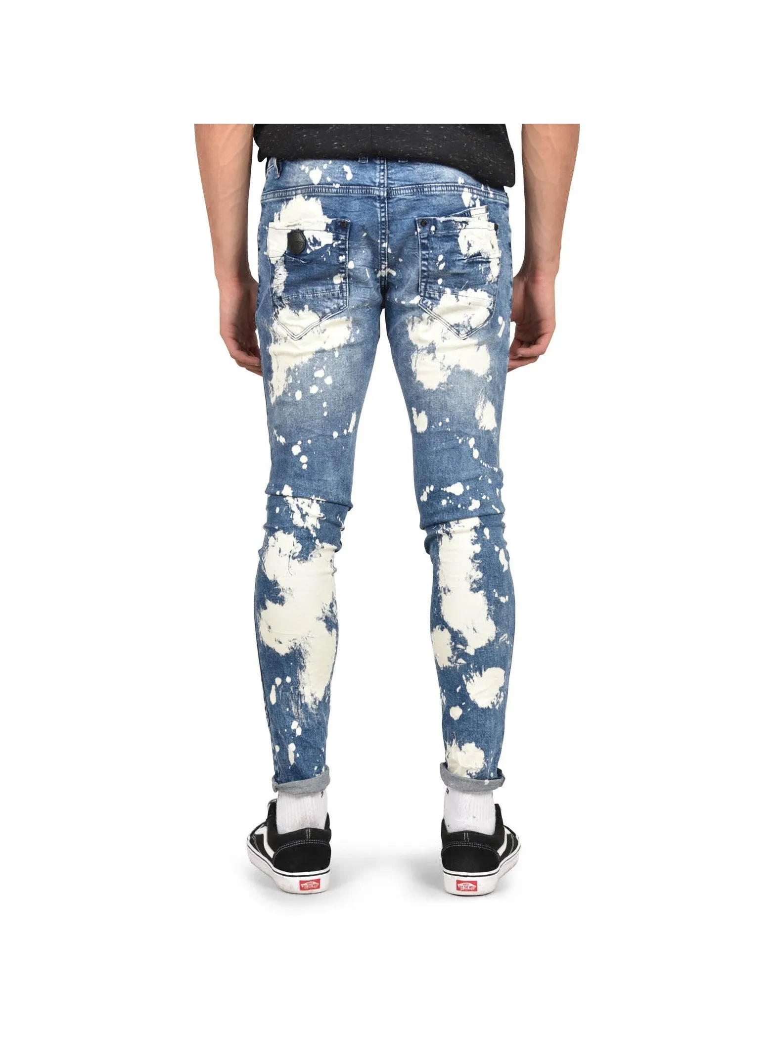 Jeans azules desteñidos y manchados